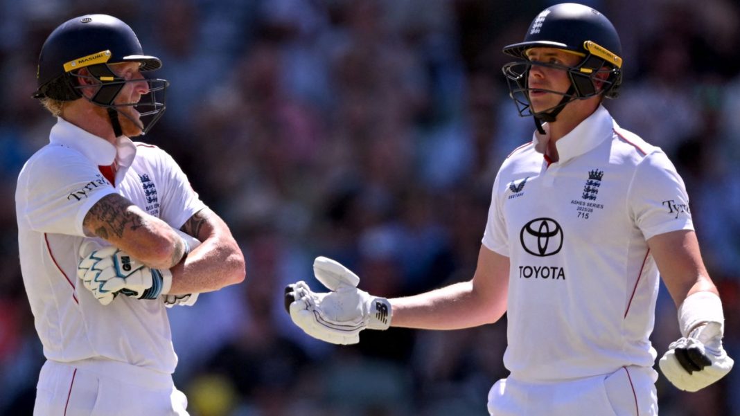 England's Jamie Smith (R) reacts after been given out as teammate Ben Stokes (L) looks on, on the second day of the third Ashes cricket Test match between Australia and England at the Adelaide Oval in Adelaide on December 18, 2025. (Photo by William WEST / AFP) / -- IMAGE RESTRICTED TO EDITORIAL USE - STRICTLY NO COMMERCIAL USE --