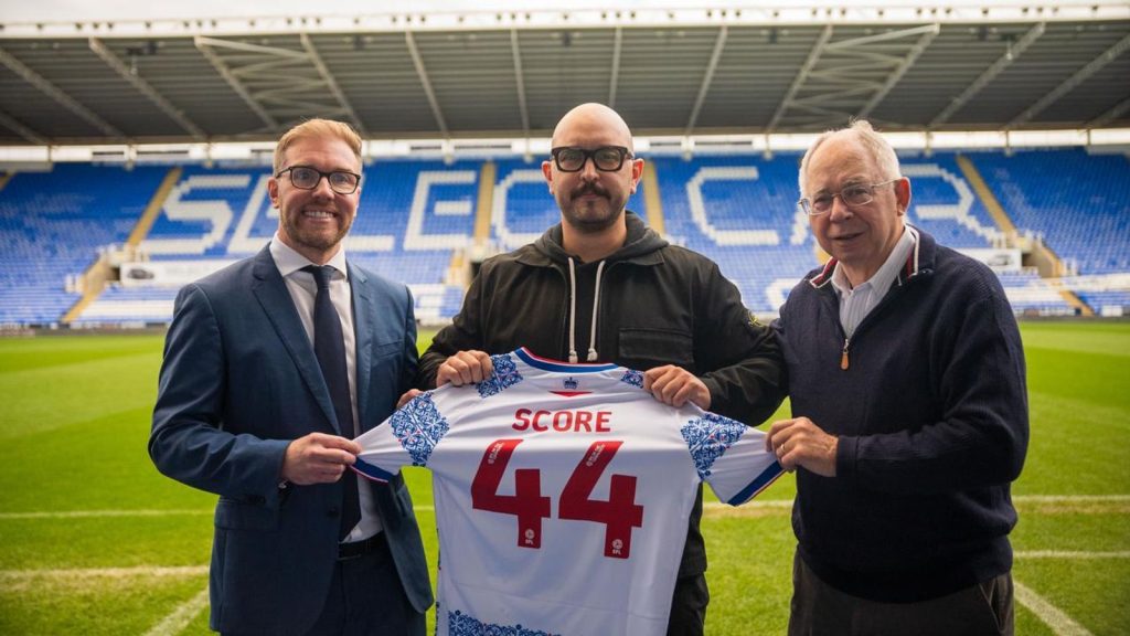 Stuart Fenton and Rob Couhig of Reading flank Max Sebti, co-founder of Score to launch the club's new artificial intelligence initiative