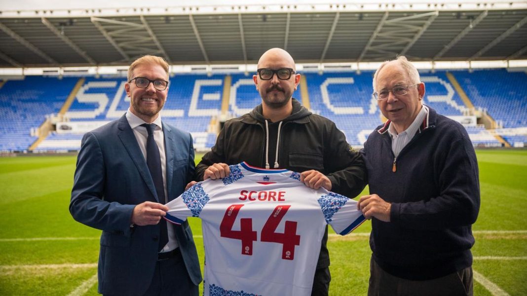 Stuart Fenton and Rob Couhig of Reading flank Max Sebti, co-founder of Score to launch the club's new artificial intelligence initiative
