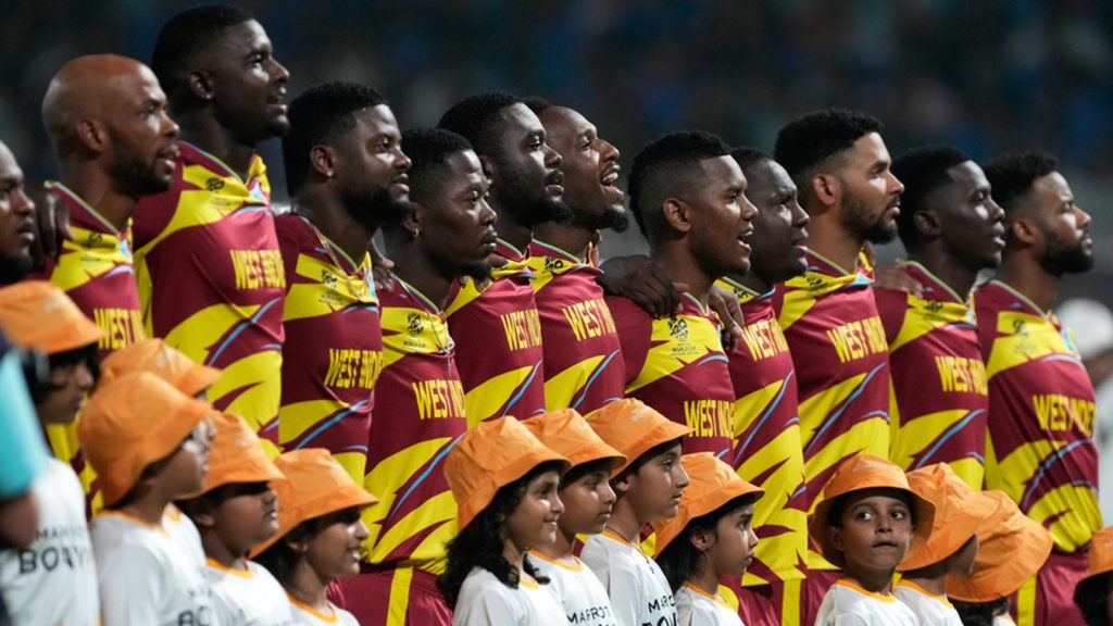 West Indies' players stand up for the national anthems before the start of the T20 World Cup cricket match between India and West Indies in Kolkata, India, Sunday, March 1, 2026. (AP Photo/Bikas Das)