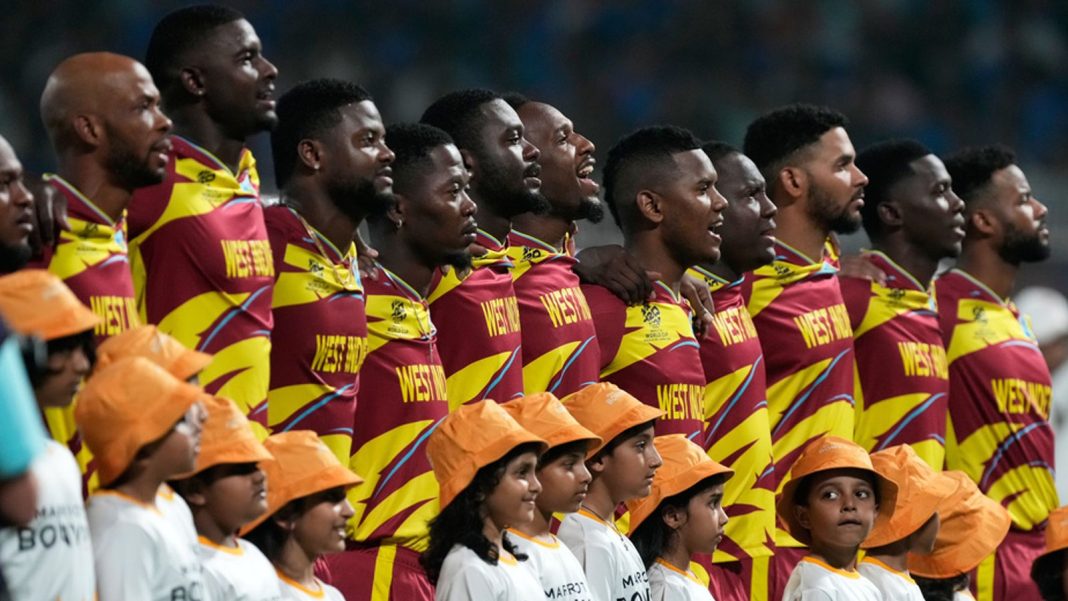 West Indies' players stand up for the national anthems before the start of the T20 World Cup cricket match between India and West Indies in Kolkata, India, Sunday, March 1, 2026. (AP Photo/Bikas Das)