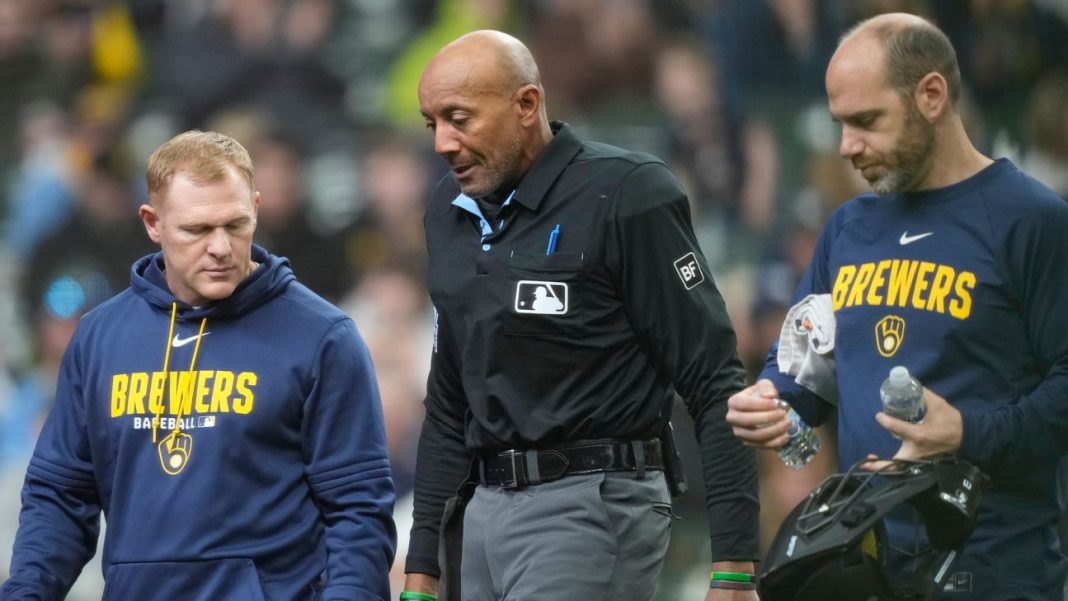 Umpire Bucknor leaves Rays-Brewers after foul tip hits mask