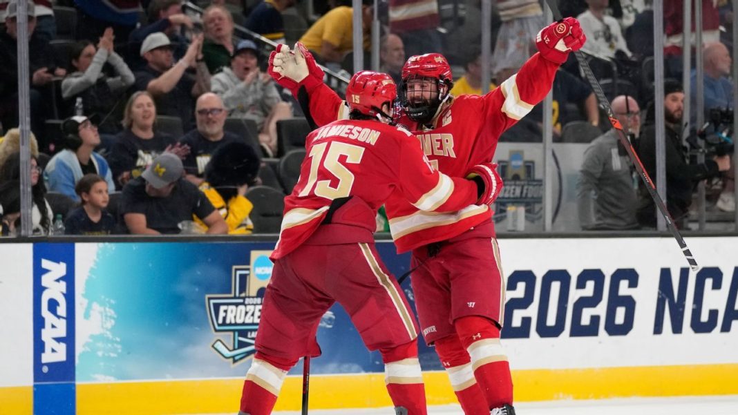 Denver stuns Michigan in 2OT, plays Wisconsin for Frozen Four title